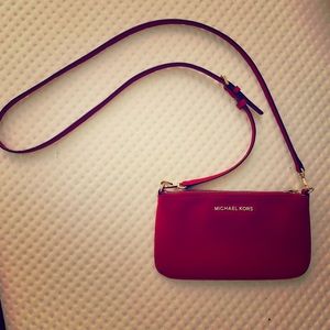 Michael kros Sling bag red color